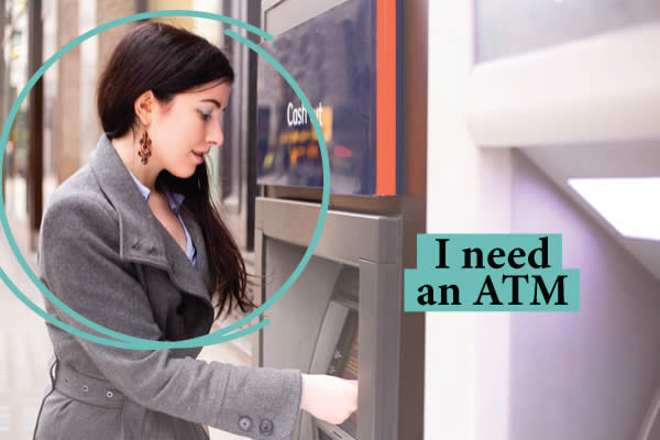 Woman using an ATM